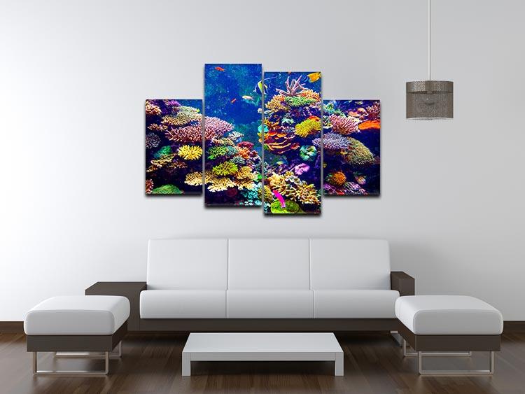 A vibrant 4-split canvas artwork featuring a coral reef and tropical fish, showcasing colorful marine life in a dynamic arrangement.