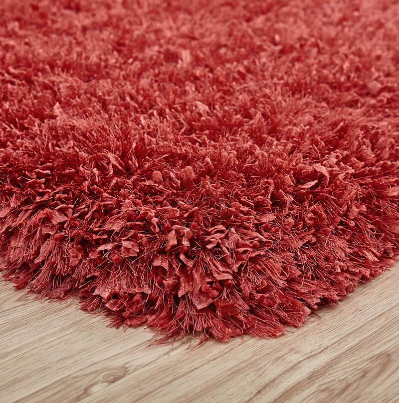 Coral Shag Area Rug in Peach, showcasing its plush high-pile texture and elegant design, perfect for enhancing home decor.