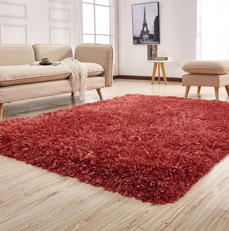 Coral Shag Area Rug in Peach, showcasing its plush high-pile texture and elegant design, perfect for enhancing home decor.