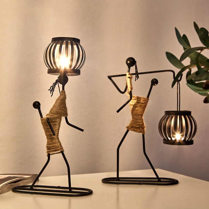 Creative Iron Candle Holder showcasing elegant design, perfect for home decor and ambiance enhancement.