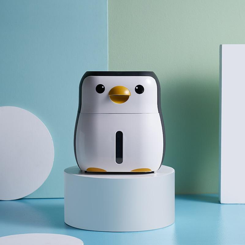 Creative penguin-shaped toilet roll paper holder, waterproof and wall-mounted, ideal for bathroom organization.
