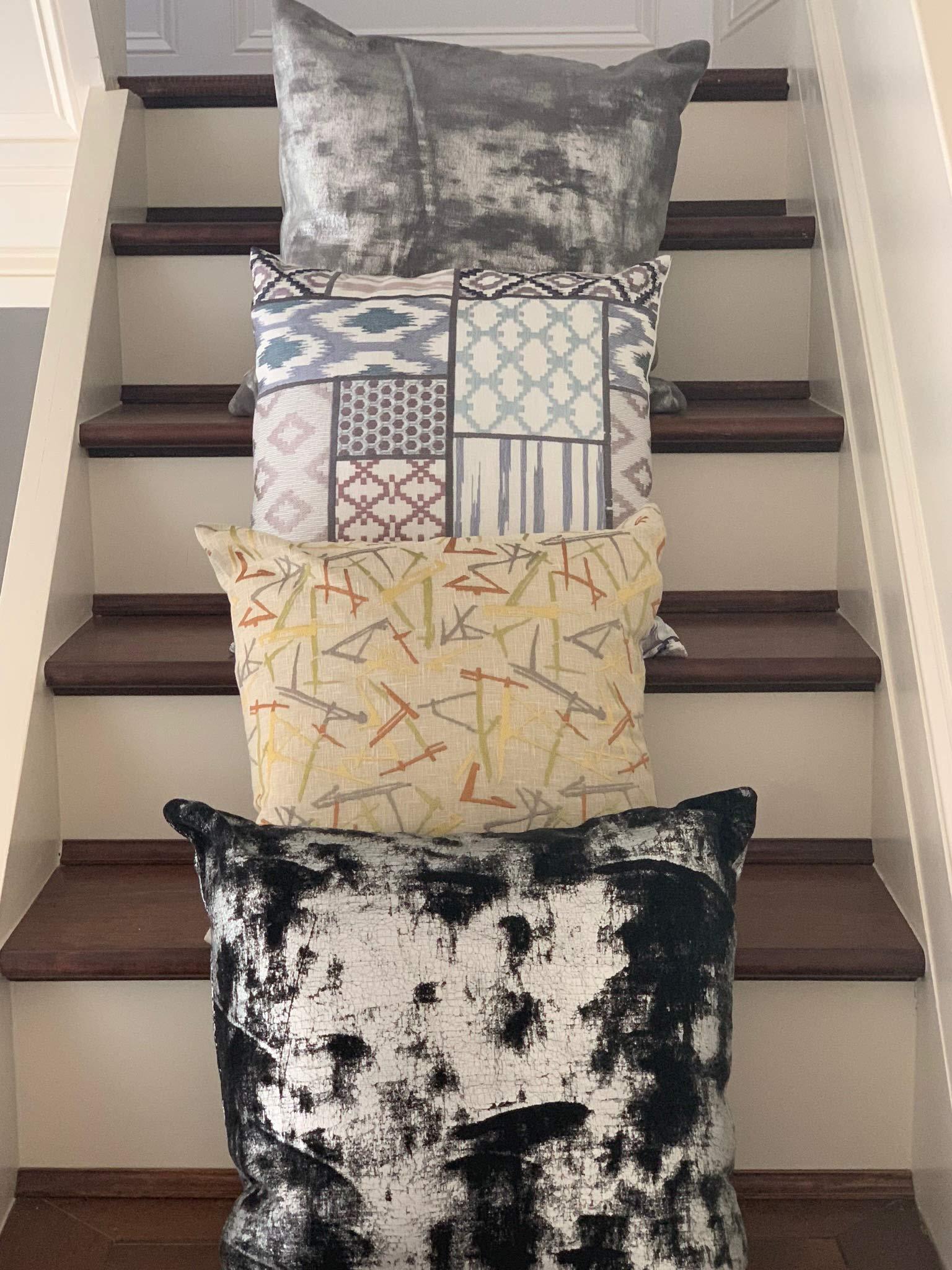 Set of two 20x20 decorative embroidered pillow covers with hidden zipper, featuring elegant designs and a soft polyester-cotton blend.