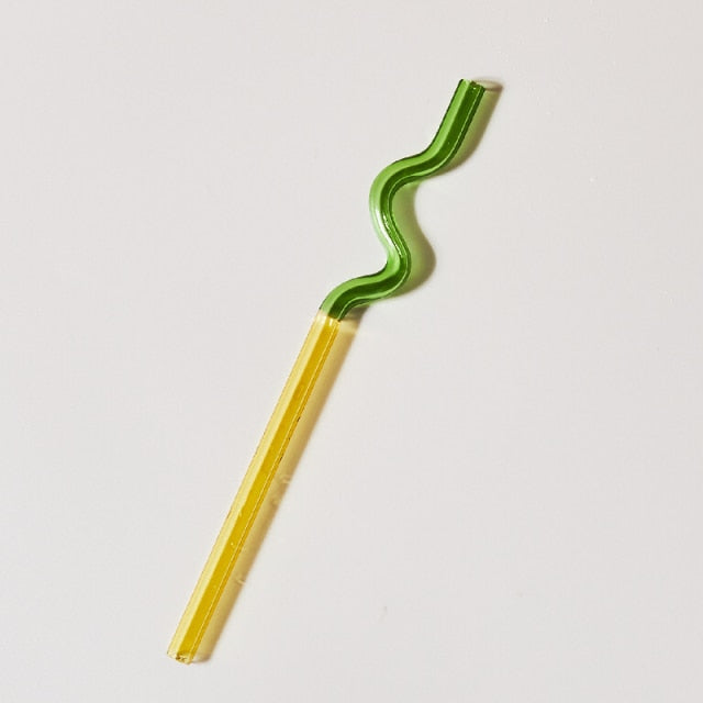 Curvy Glass Straw Set featuring colorful, elegant straws made from durable borosilicate glass, with a cleaning brush included.