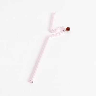 Curvy Glass Straw Set featuring colorful, elegant straws made from durable borosilicate glass, with a cleaning brush included.