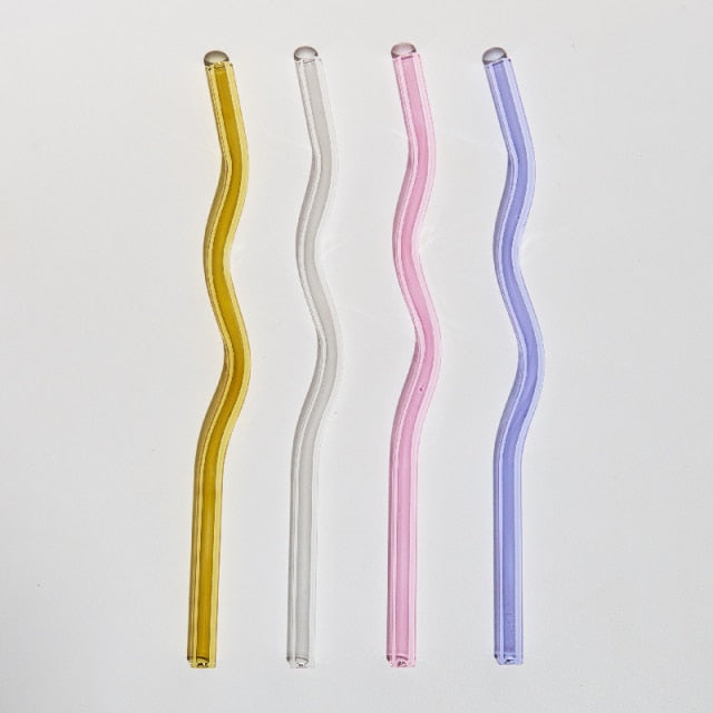 Curvy Glass Straw Set featuring colorful, elegant straws made from durable borosilicate glass, with a cleaning brush included.