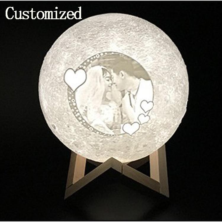 A stylish CUSTOM LED Table Light shaped like a moon, featuring a white PLD body and touch control, perfect for indoor lighting.