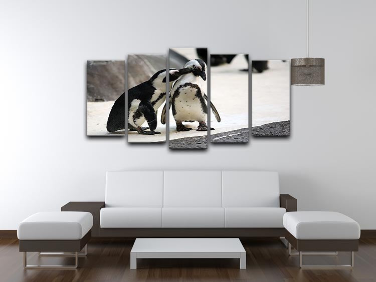 A charming 5-split panel canvas featuring a cute affectionate penguin couple, perfect for home decor.