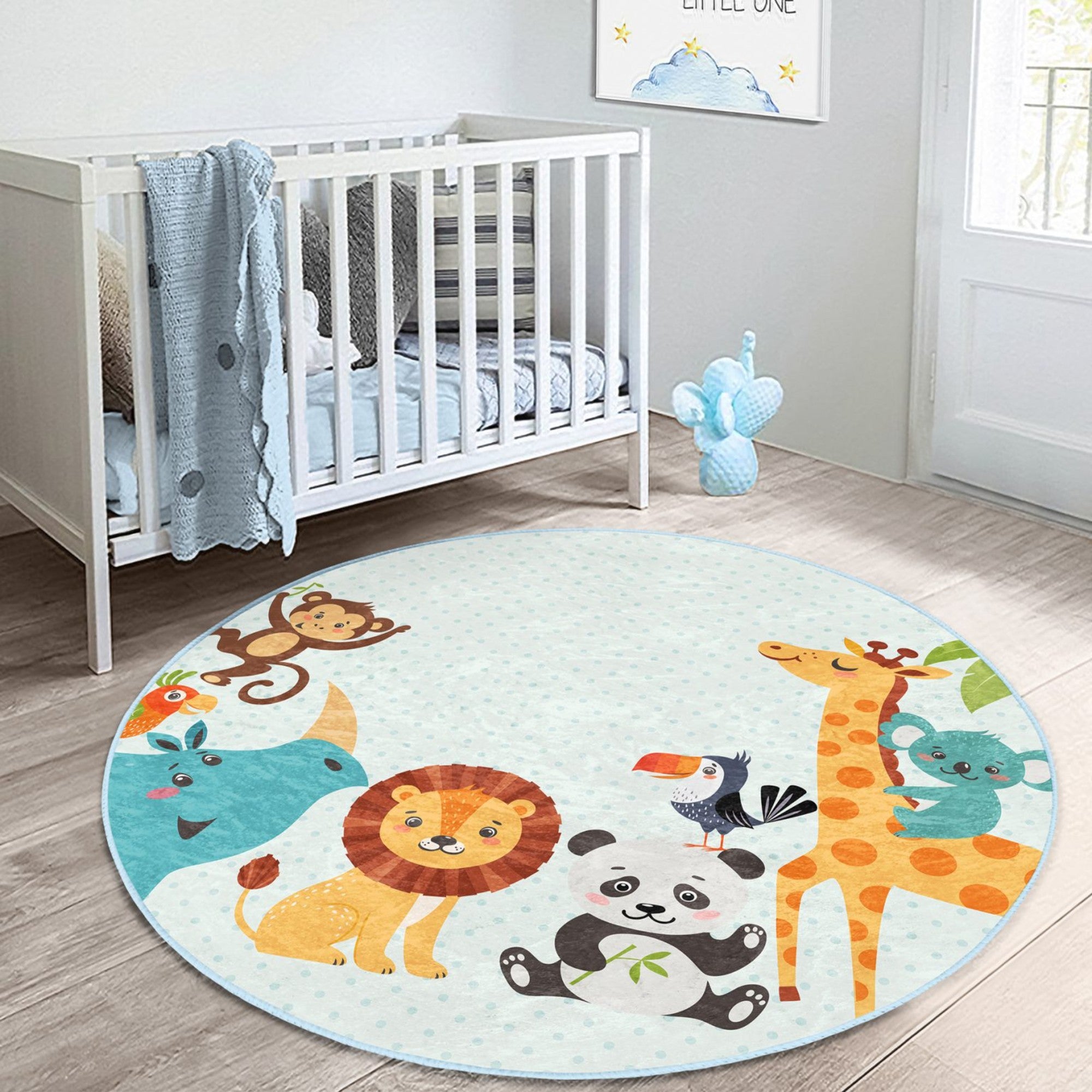 A colorful round rug featuring cute safari animals like lions, elephants, and giraffes, designed for children's rooms, showcasing a playful and inviting atmosphere.
