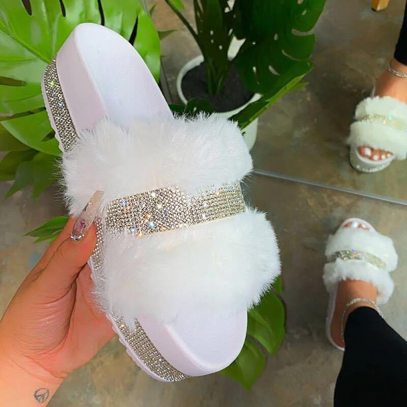 Cute Women Fur Slides featuring bling rhinestones, designed for summer and cozy indoor wear, showcasing a fluffy and stylish appearance.