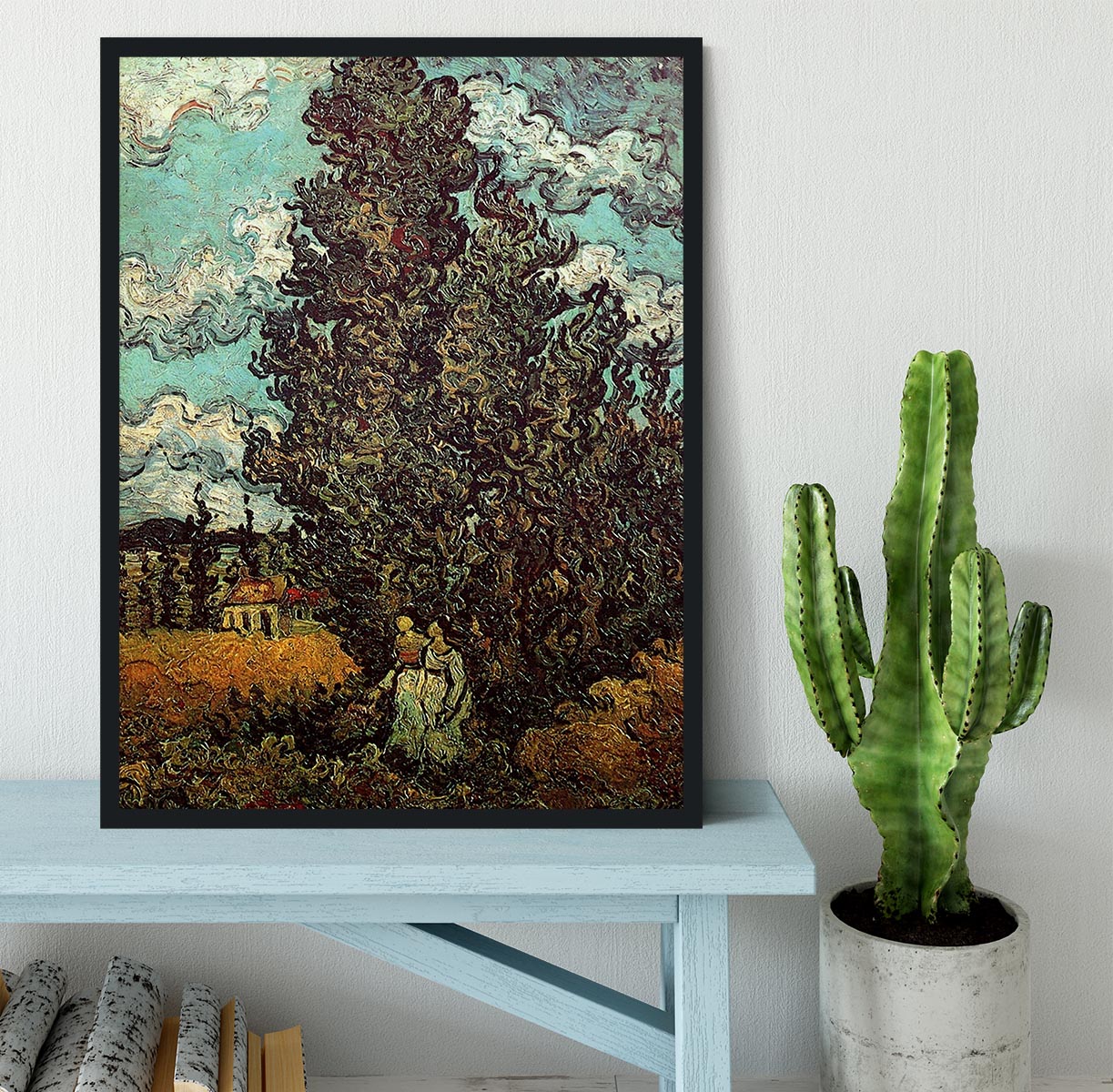 Framed print of Van Gogh's Cypresses and Two Women, showcasing vibrant colors and intricate details in a stylish frame.