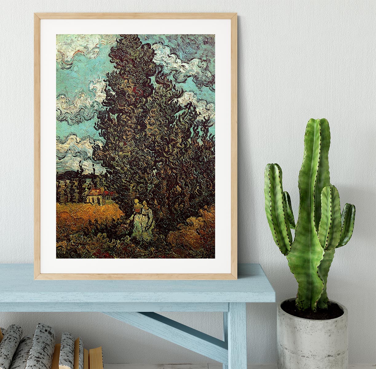 Framed print of Van Gogh's Cypresses and Two Women, showcasing vibrant colors and intricate details in a stylish frame.