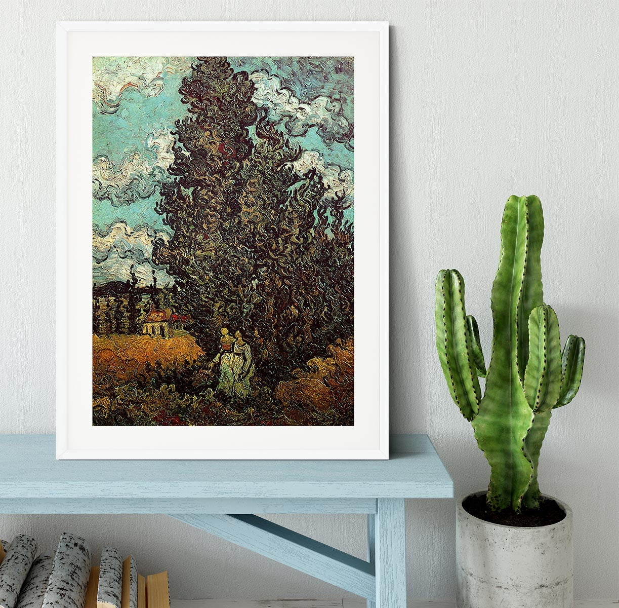 Framed print of Van Gogh's Cypresses and Two Women, showcasing vibrant colors and intricate details in a stylish frame.