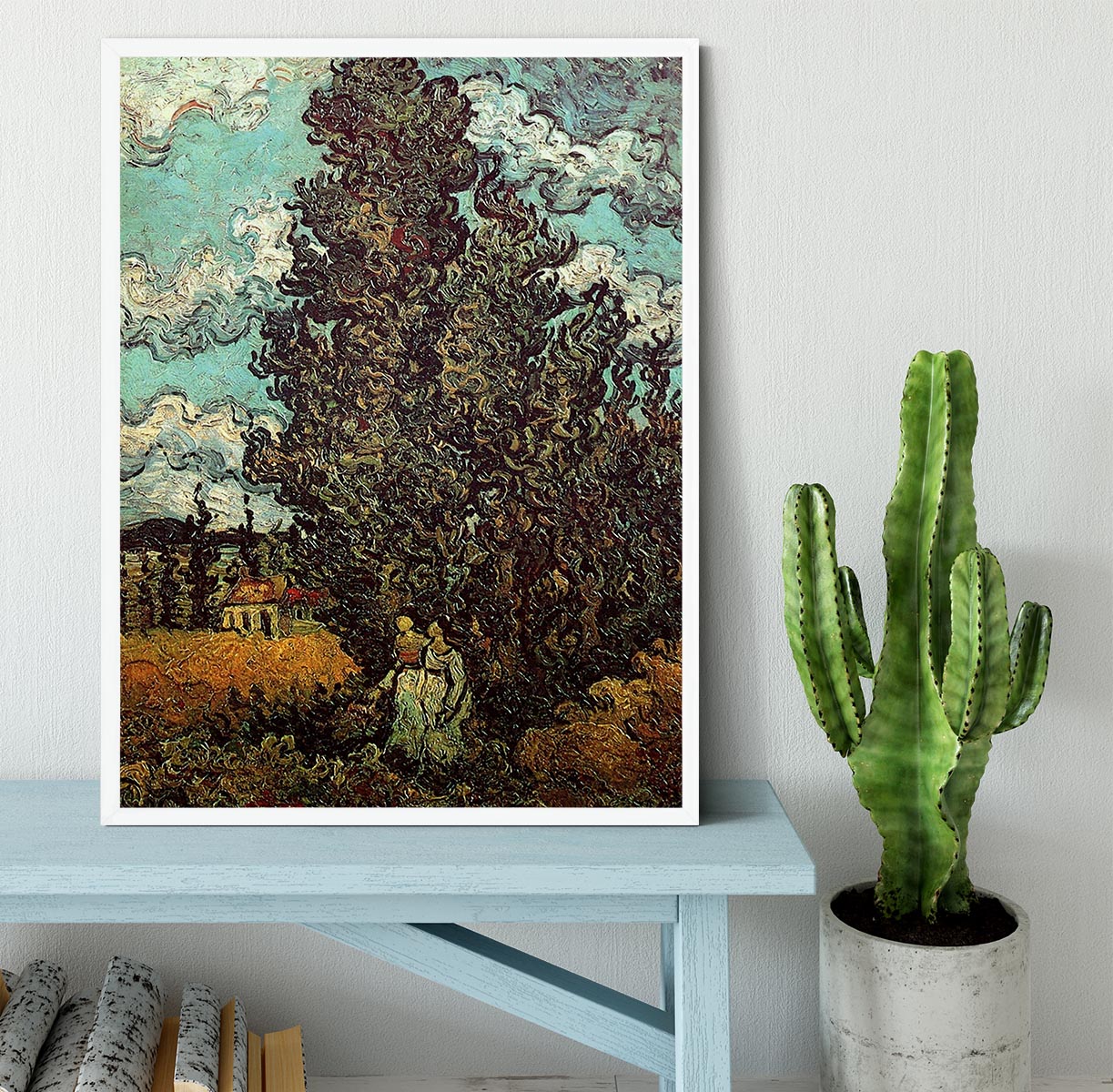 Framed print of Van Gogh's Cypresses and Two Women, showcasing vibrant colors and intricate details in a stylish frame.