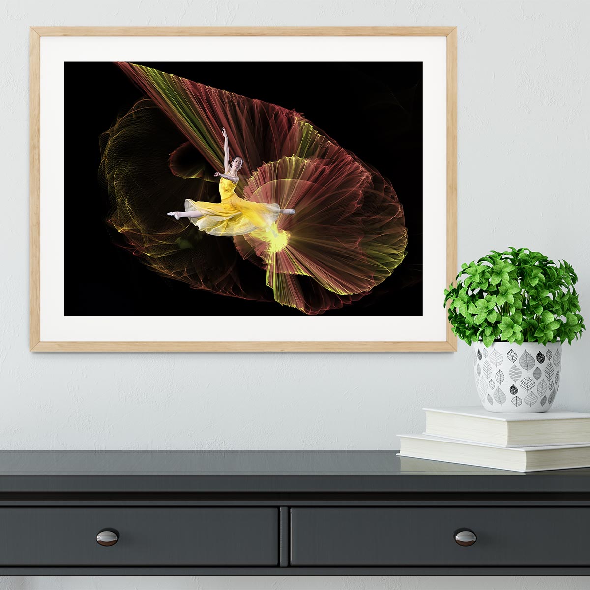 Dancer With Light Framed Print showcasing vibrant colors in a handmade frame, available in black, white, or natural wood.