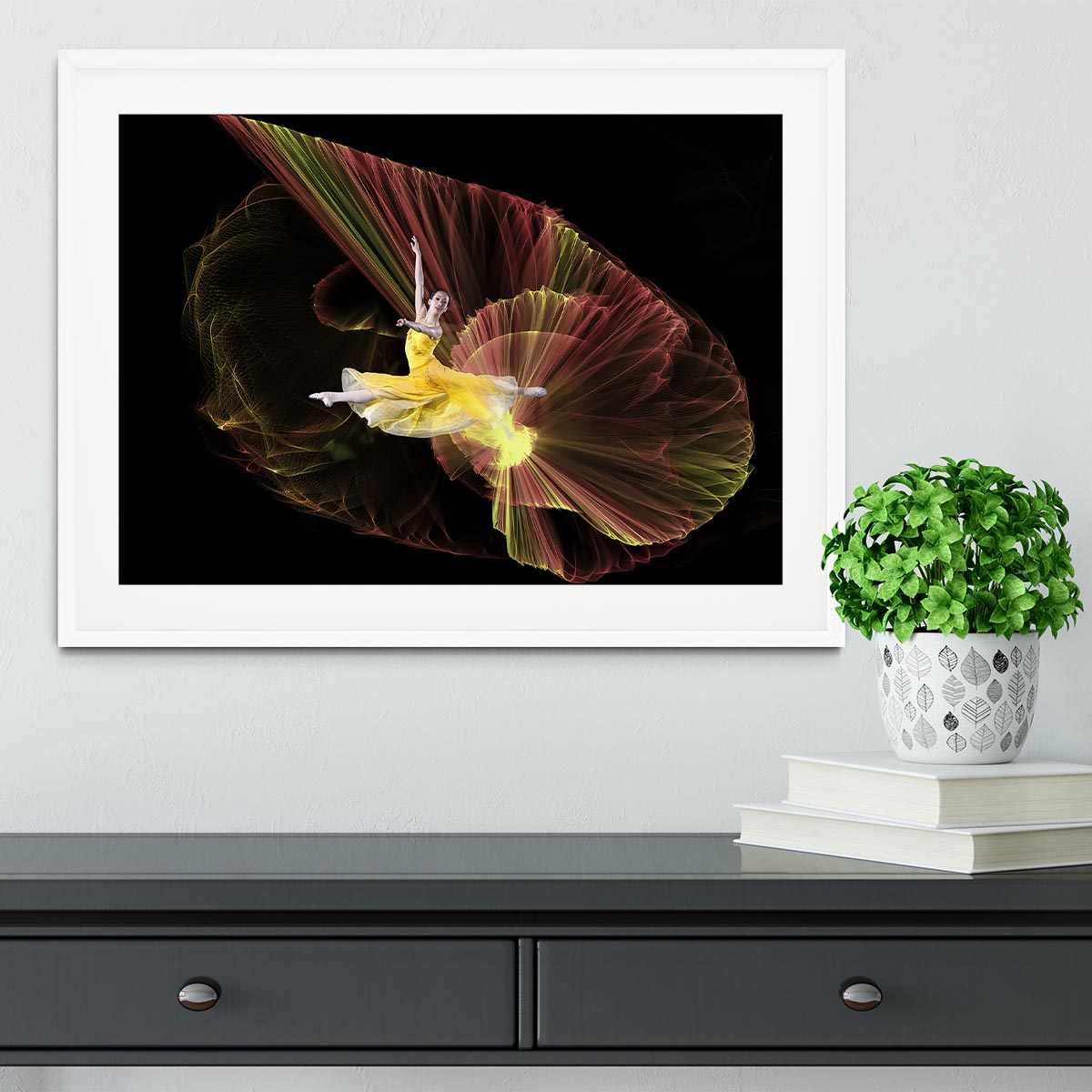 Dancer With Light Framed Print showcasing vibrant colors in a handmade frame, available in black, white, or natural wood.