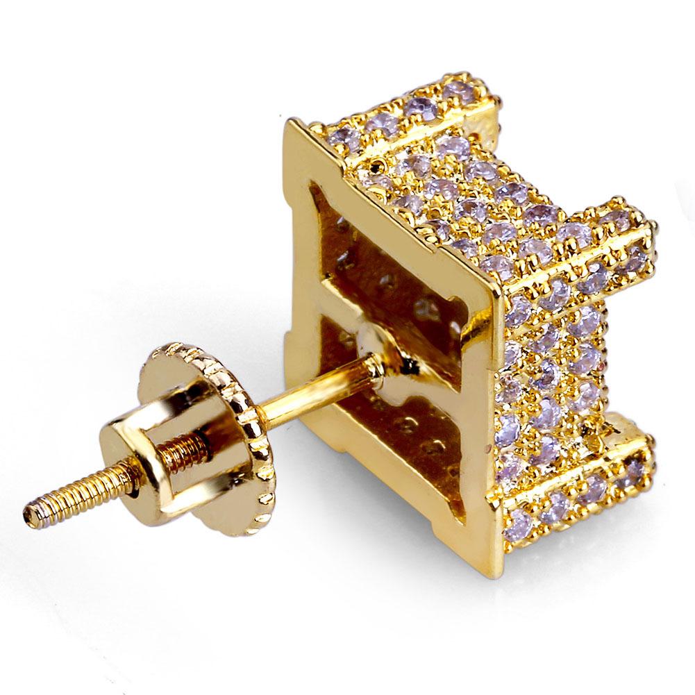 A pair of luxurious designer hip hop earrings featuring sparkling cubic zirconia stones set in a gold-plated design, perfect for stylish men.