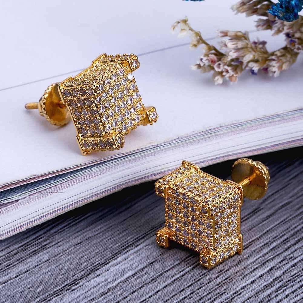 A pair of luxurious designer hip hop earrings featuring sparkling cubic zirconia stones set in a gold-plated design, perfect for stylish men.