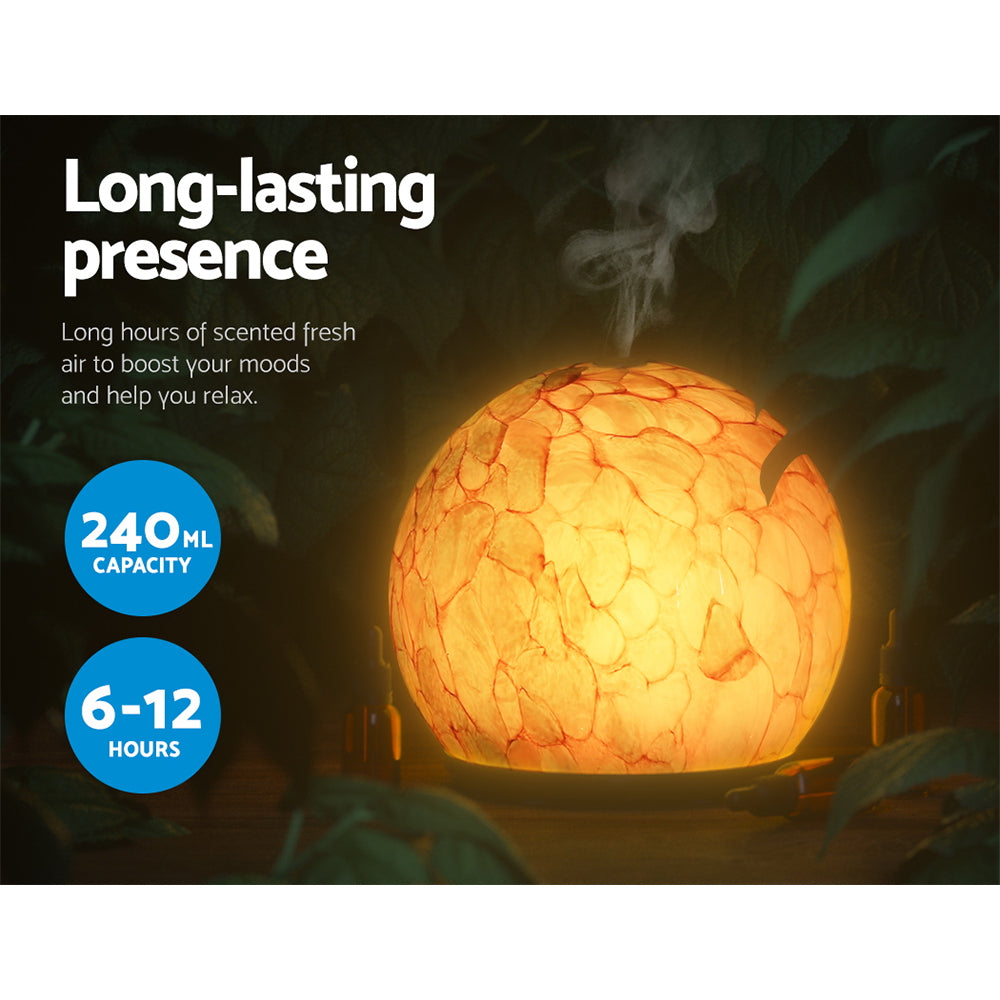 Devanti 240ml Aroma Diffuser with LED light, showcasing its sleek design and blue color, perfect for aromatherapy and home decor.