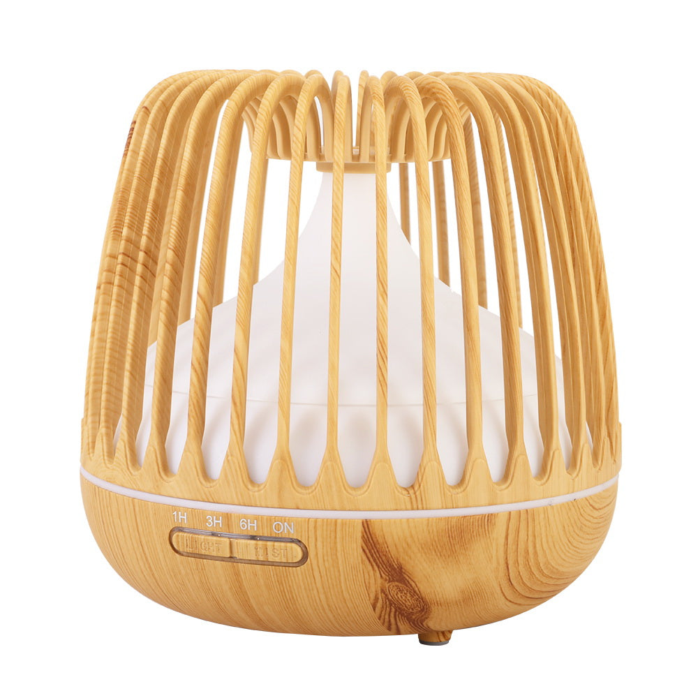 Devanti 4-In-1 Aroma Diffuser in light wood grain design, showcasing its sleek caged structure and LED night light features.