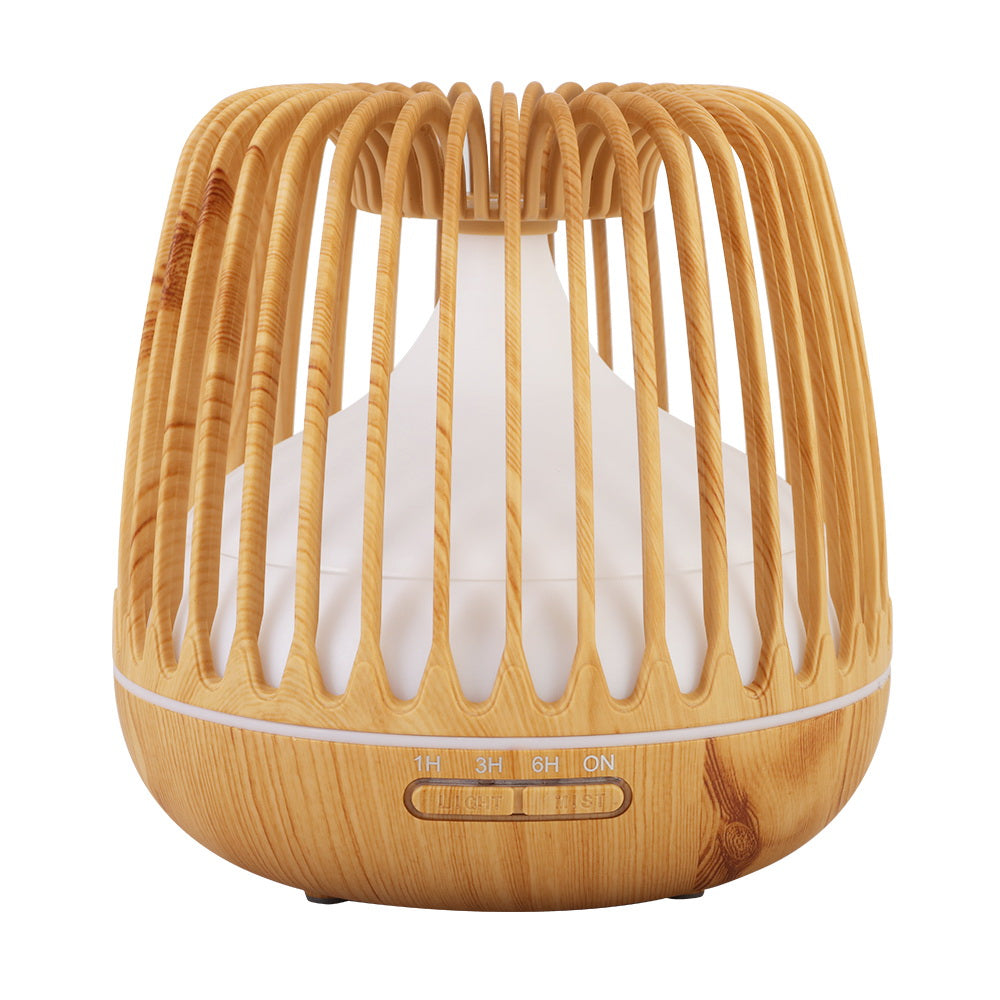Devanti 4-In-1 Aroma Diffuser in light wood grain design, showcasing its sleek caged structure and LED night light features.