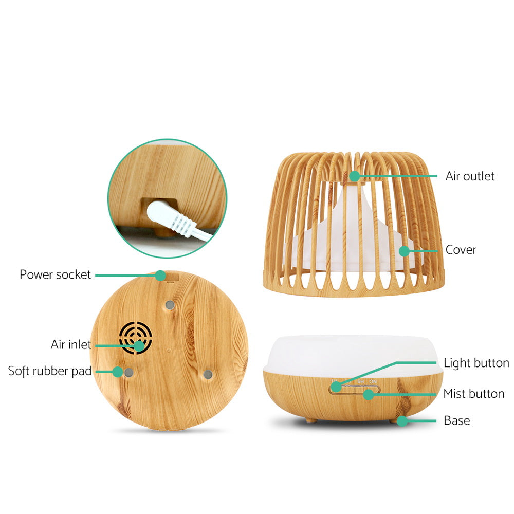 Devanti 4-In-1 Aroma Diffuser in light wood grain design, showcasing its sleek caged structure and LED night light features.