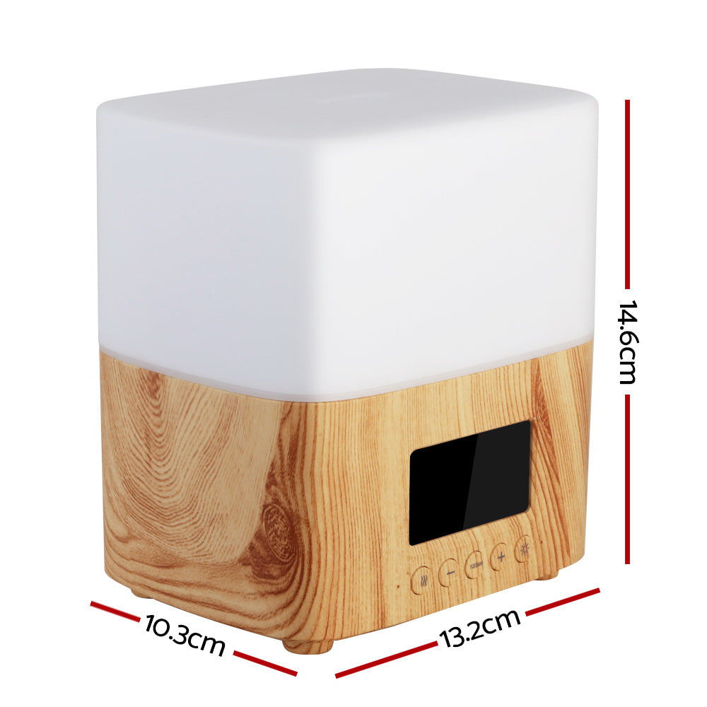 Devanti Aroma Diffuser in light wood grain design, showcasing its sleek modern look and LED night light feature.