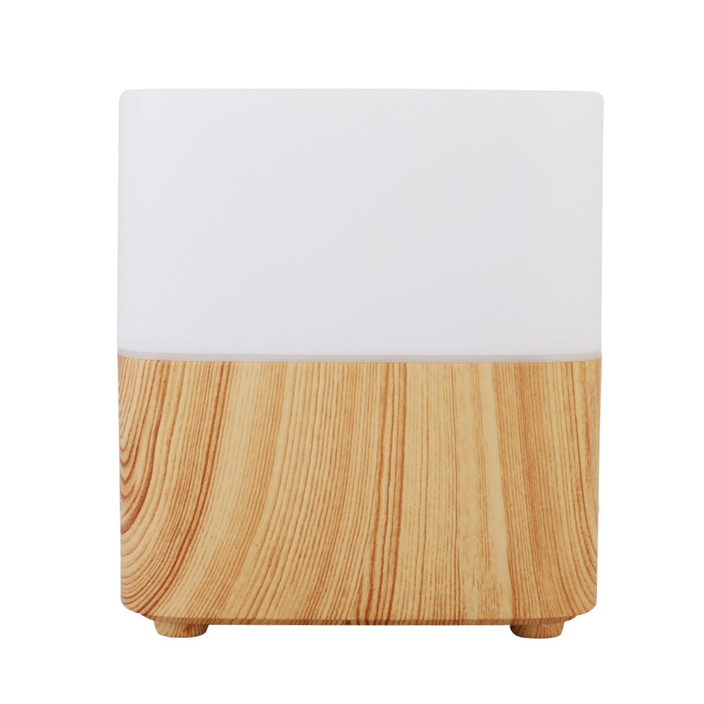 Devanti Aroma Diffuser in light wood grain design, showcasing its sleek modern look and LED night light feature.