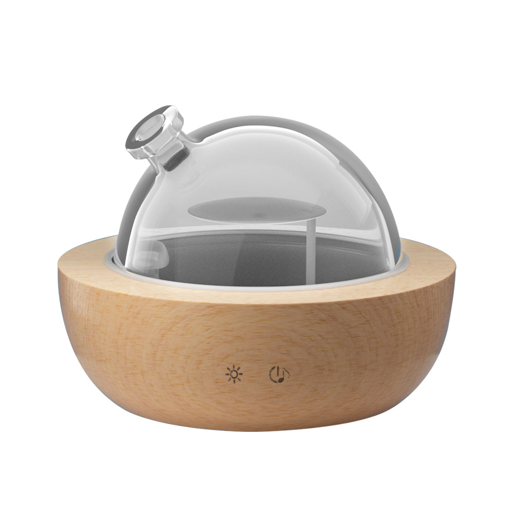 Devanti Aroma Diffuser featuring a glass dome and wood base, designed for aromatherapy and humidification.