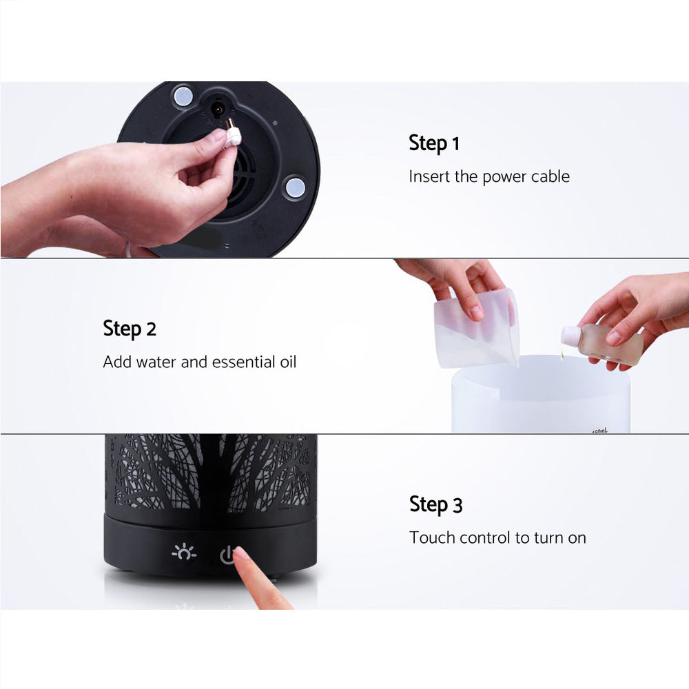 DEVANTI Aroma Diffuser featuring an enchanted forest pattern and LED night light, designed for aromatherapy and air purification.