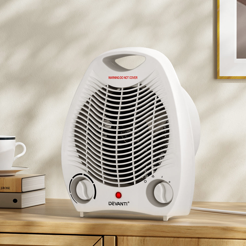 Devanti Electric Fan Heater in white, showcasing its compact design and adjustable thermostat control.