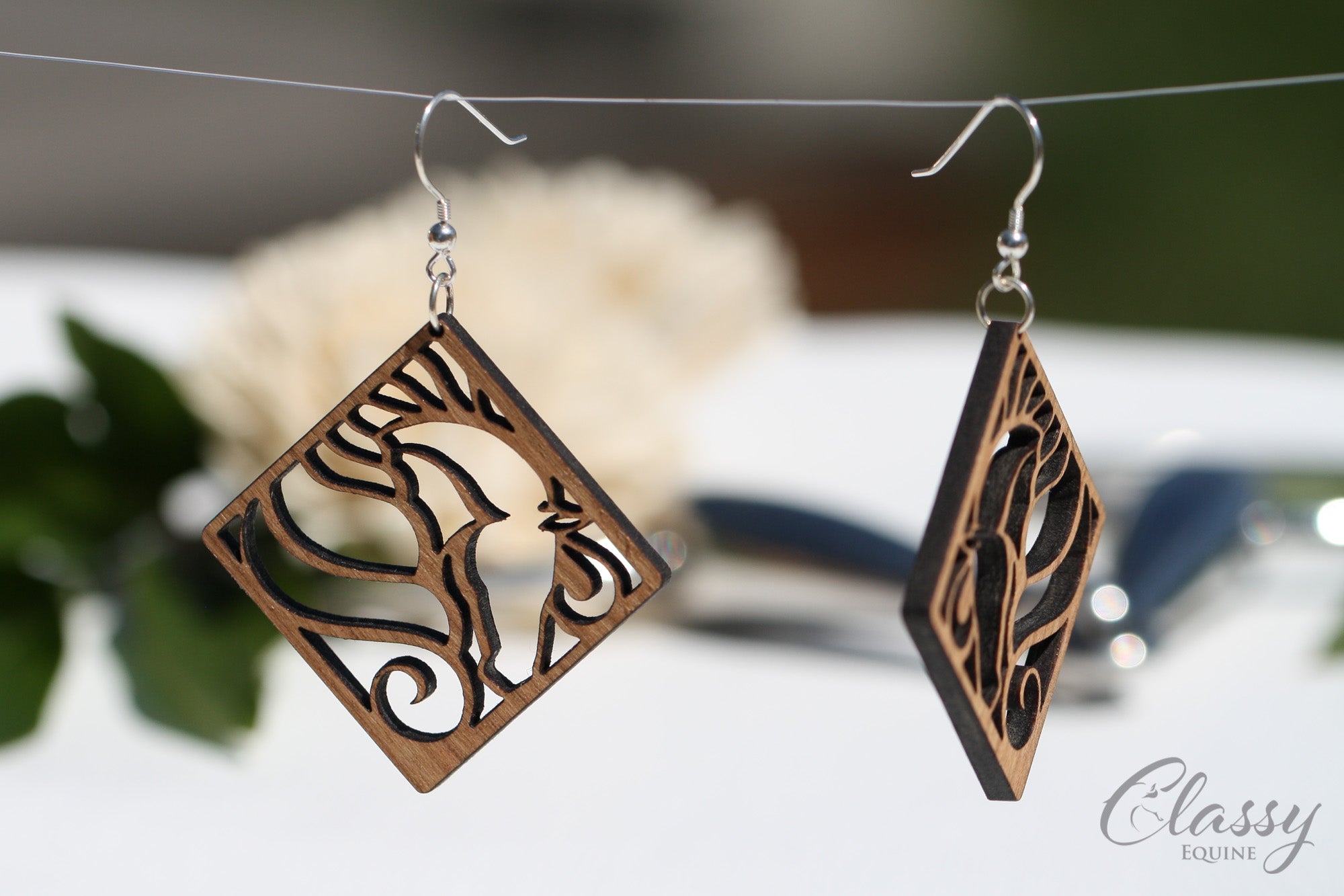 Diamond Horse Head Cherry Hardwood Equestrian Earrings, showcasing a unique snaffle bit design, crafted from cherry hardwood with sterling silver findings.