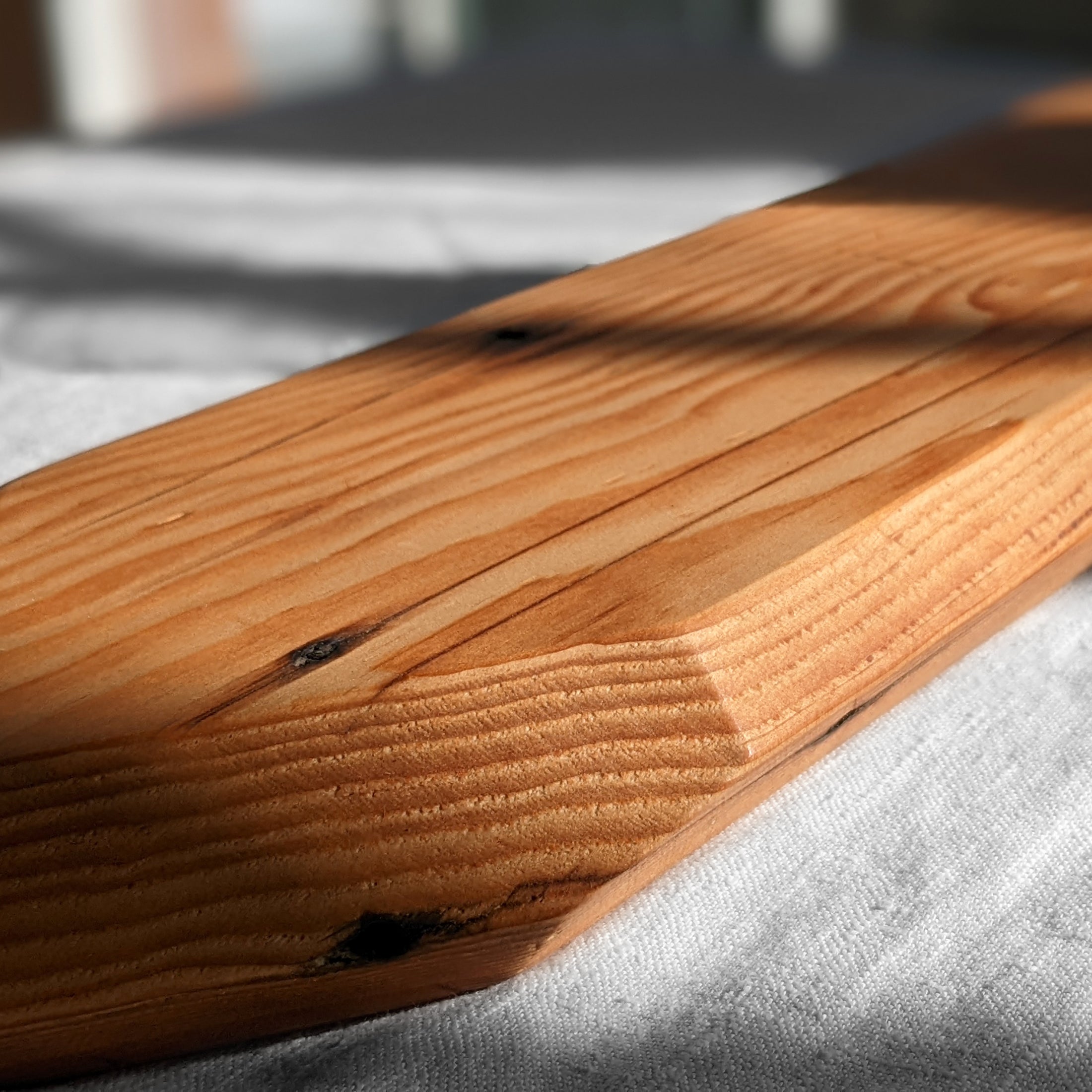 Elegant Diamond server made from unique Doug Fir wood with a beeswax finish, showcasing appetizers beautifully.