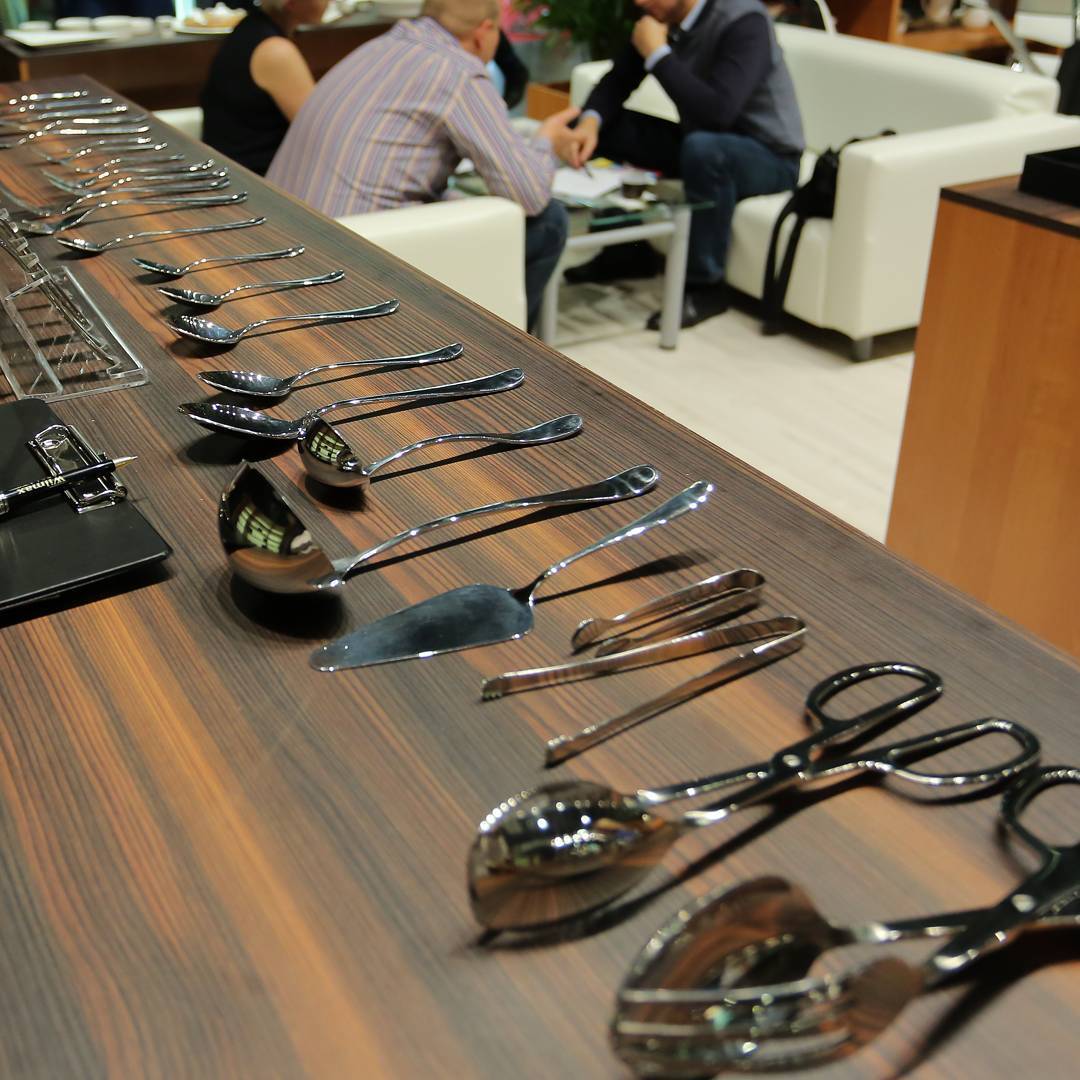 An elegant 8-inch WILMAX dinner spoon made of high polish stainless steel, showcasing its smooth texture and finely balanced handle.