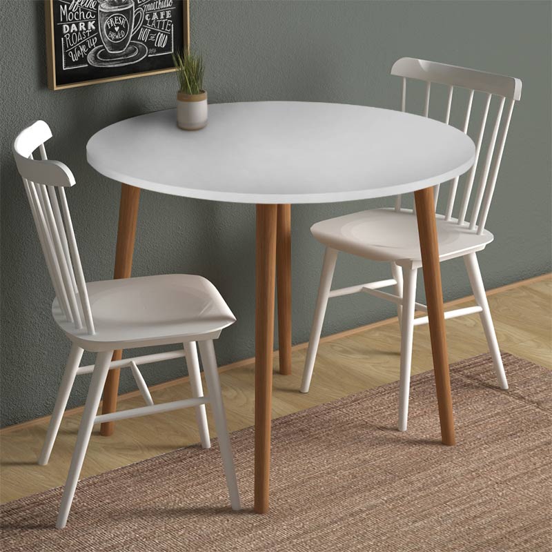 Round white dining table made of melamine with solid beech wood legs, measuring 92x92x75 cm.