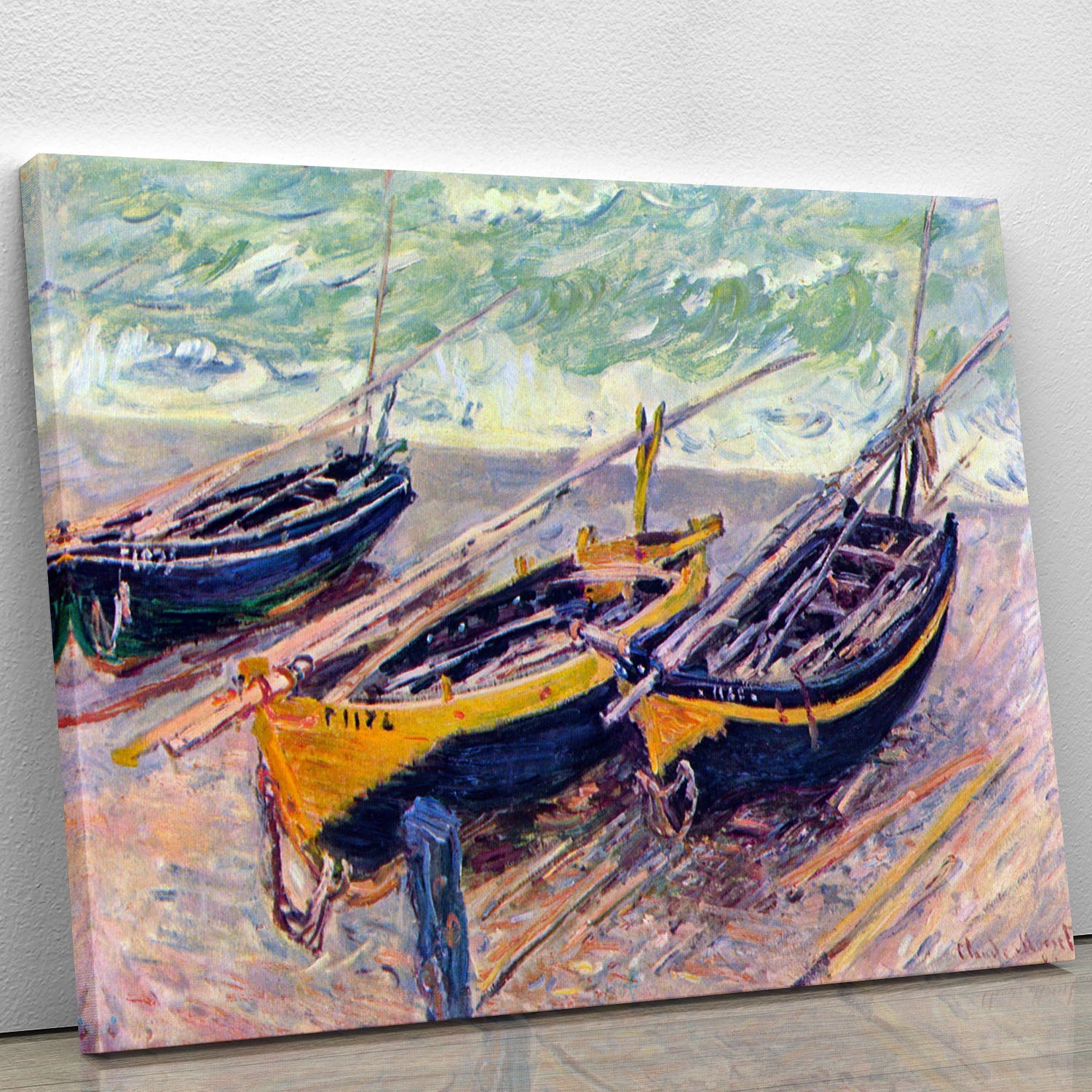Canvas print of Monet's Dock of Etretat featuring three fishing boats in a serene coastal landscape.