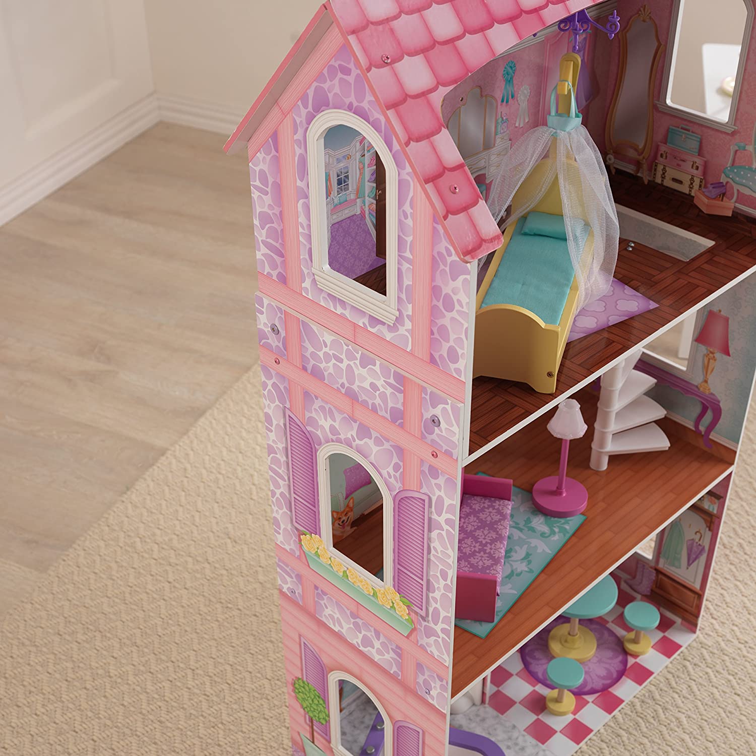 Colorful wooden dollhouse with furniture, featuring three levels and four rooms, designed for kids' imaginative play.