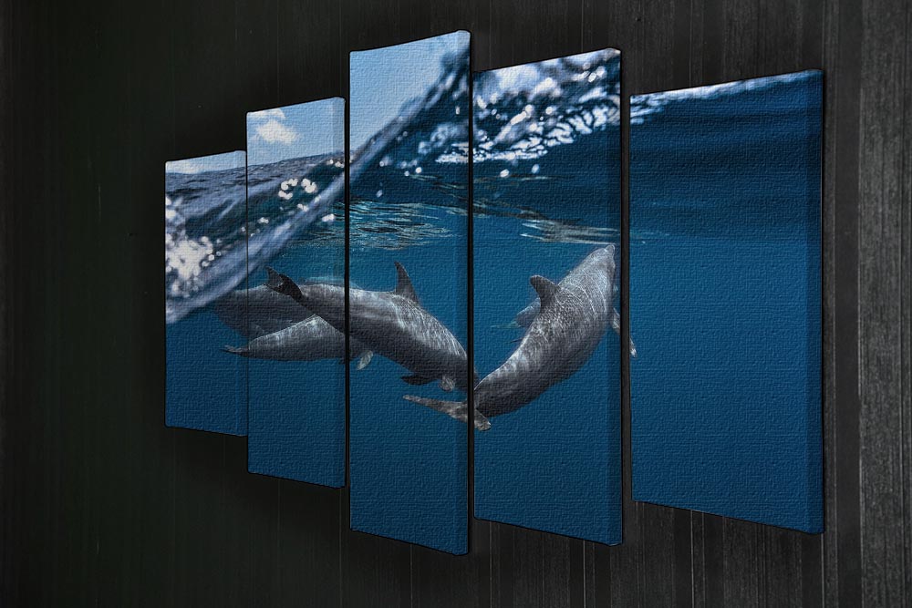A vibrant 5-split canvas artwork featuring dolphins in a dynamic ocean scene, showcasing their grace and beauty across five panels.