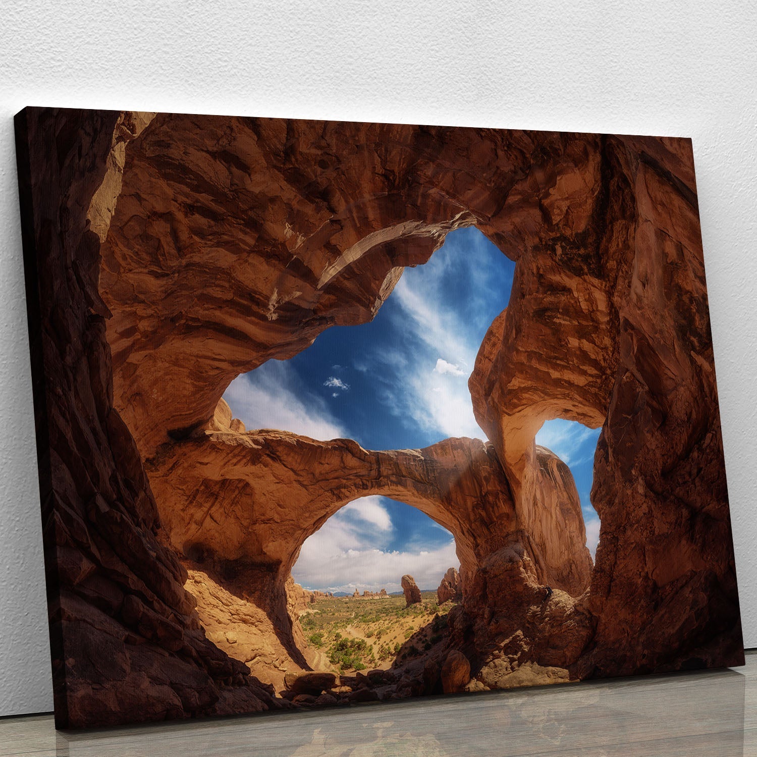A beautiful Double Arch Canvas Print showcasing the iconic rock formation in vibrant colors, perfect for home decor.