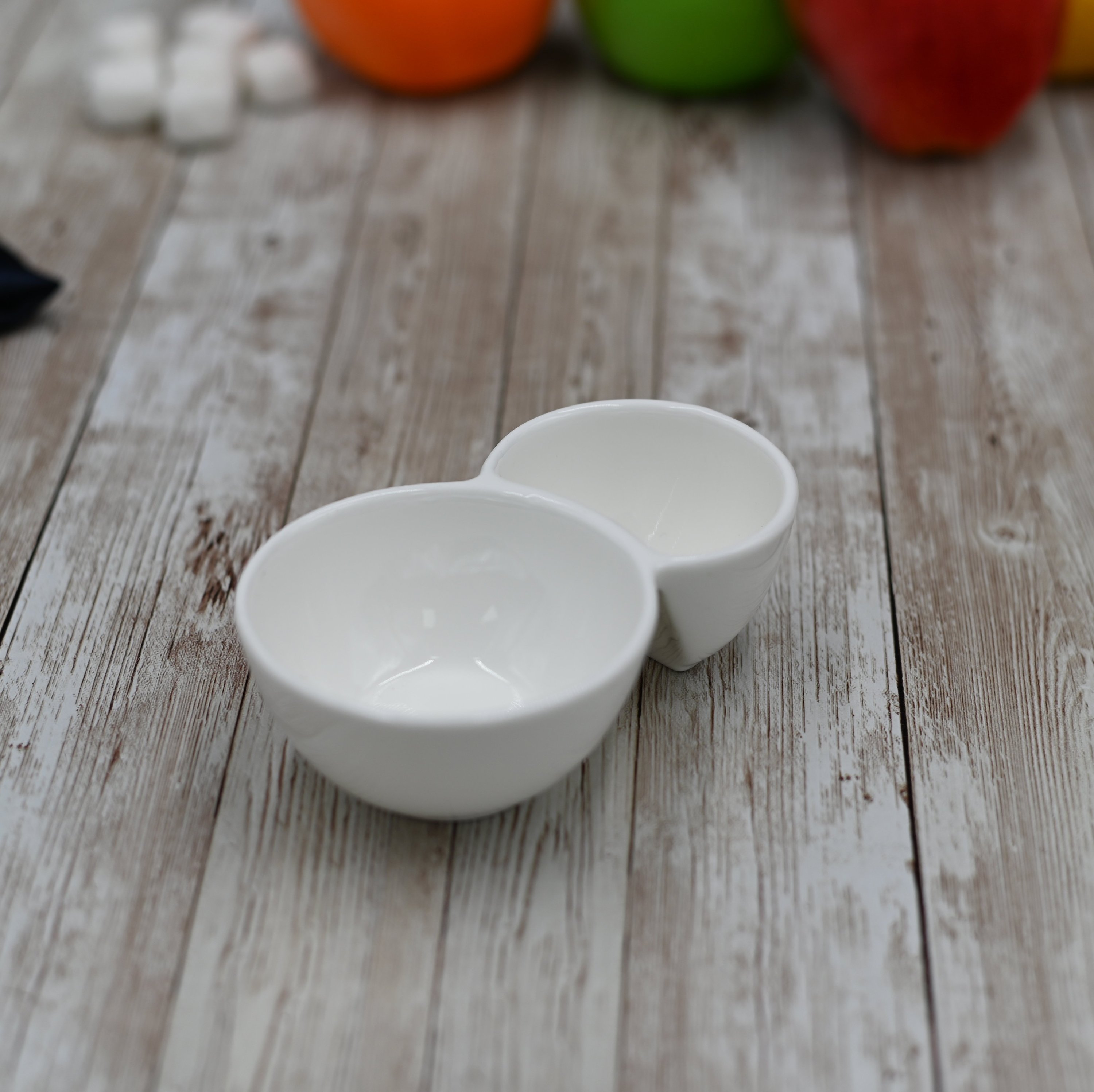 Double White Dish with two round compartments, made of fine porcelain, ideal for elegant serving.