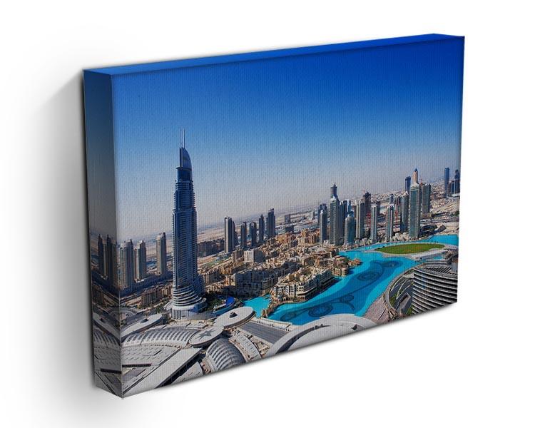 A vibrant canvas print of Downtown Dubai showcasing its modern skyline and architectural beauty.