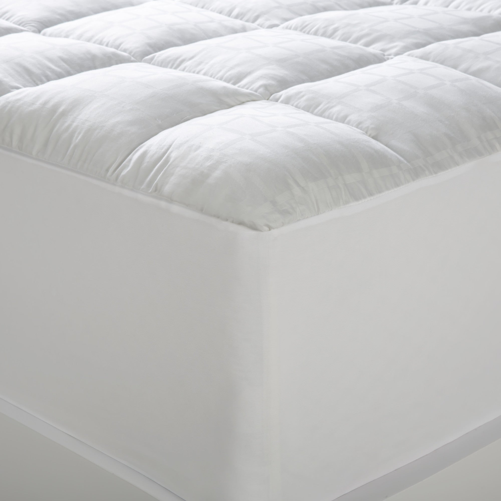Dreamaker Ball Fibre Mattress Topper for King Single Bed, featuring soft dobby woven sateen cotton and plush 1000gsm polyester filling.
