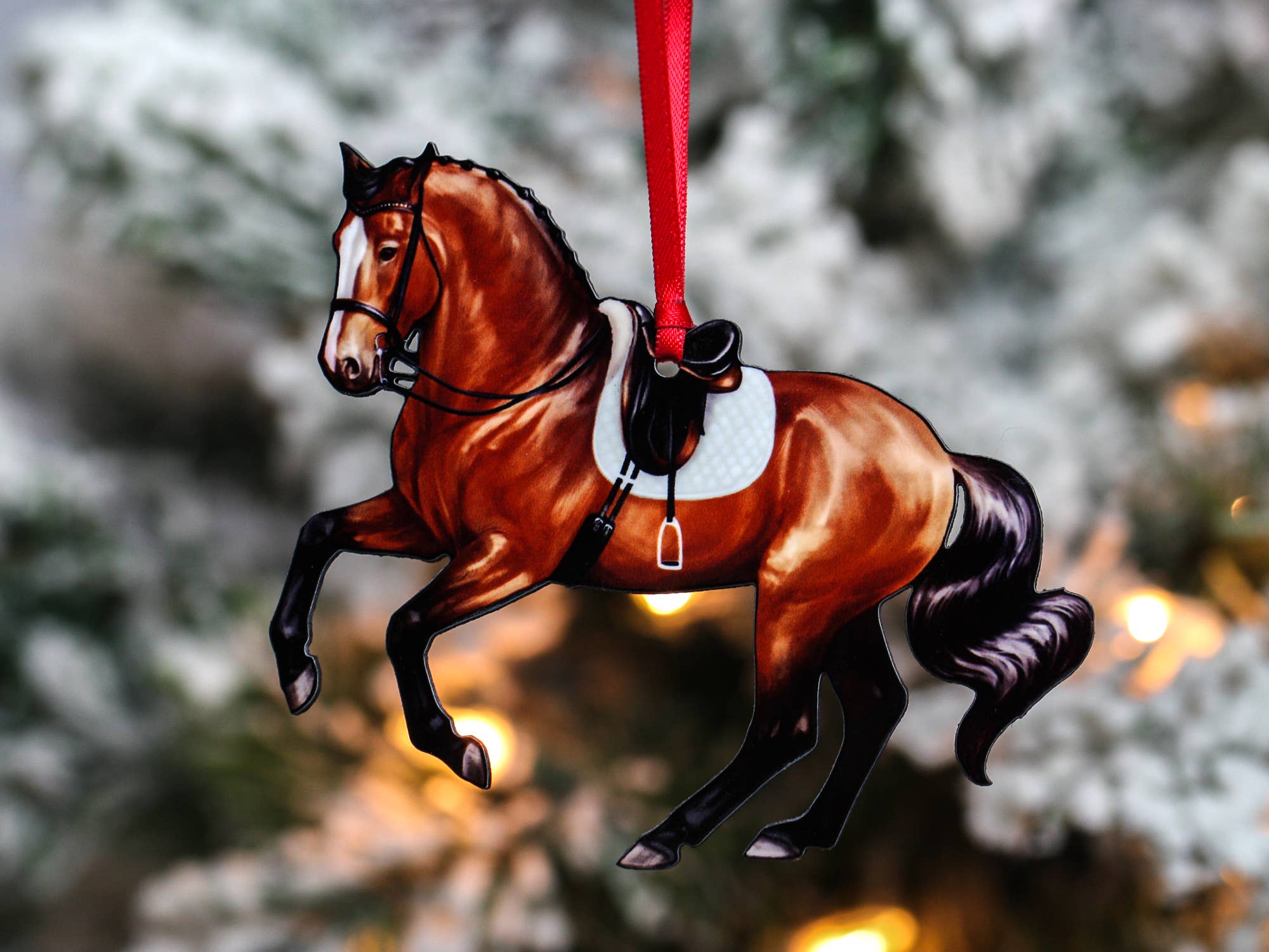 Bay dressage horse ornament in pirouette pose, handmade from composite wood with glossy finish.