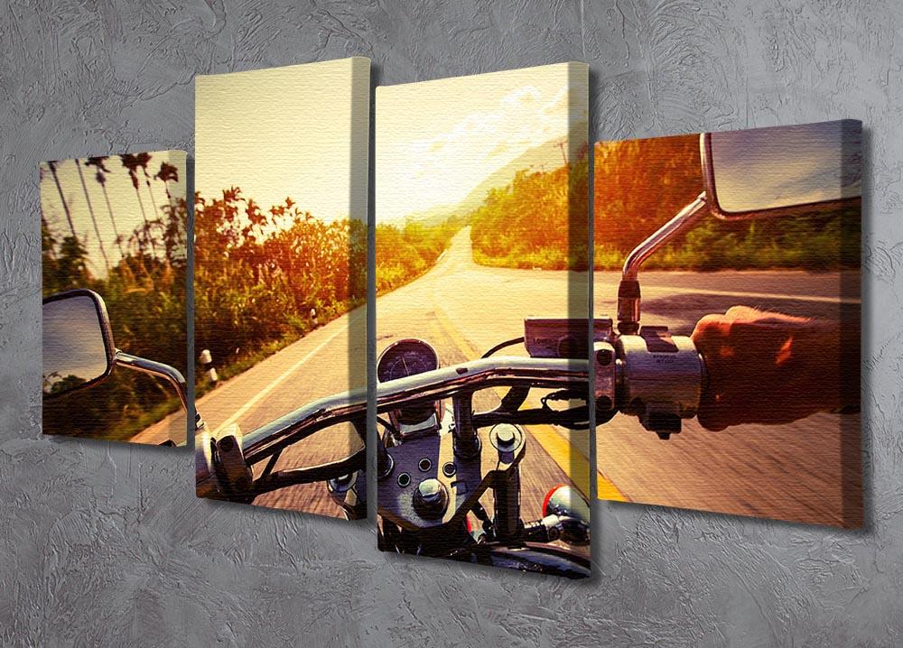 A vibrant 4-split canvas artwork featuring a motorbike rider, showcasing dynamic movement and adventure.
