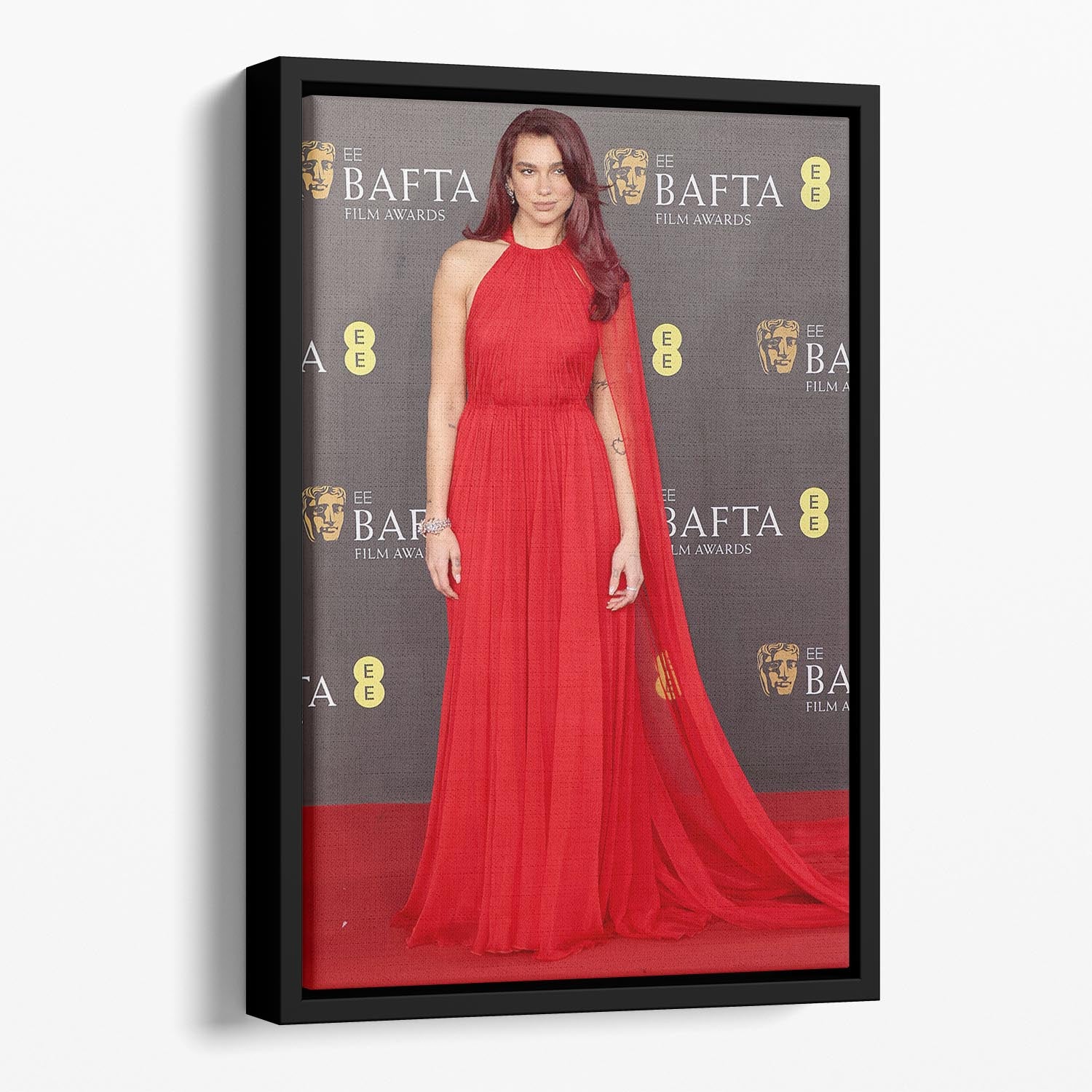 Dua Lipa at the Baftas Floating Framed Canvas featuring vibrant colors and abstract design in a handcrafted wooden frame.