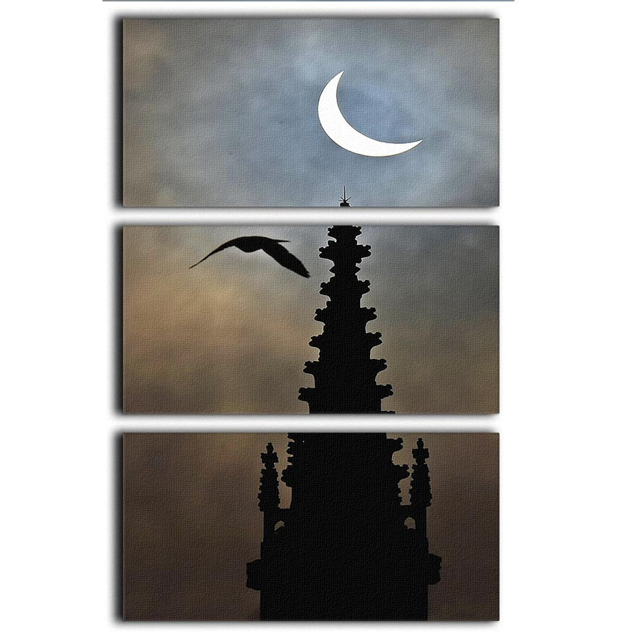 Eclipse over Worcester Cathedral 3-panel canvas print showcasing a stunning view of the cathedral under an eclipse, perfect for home decor.