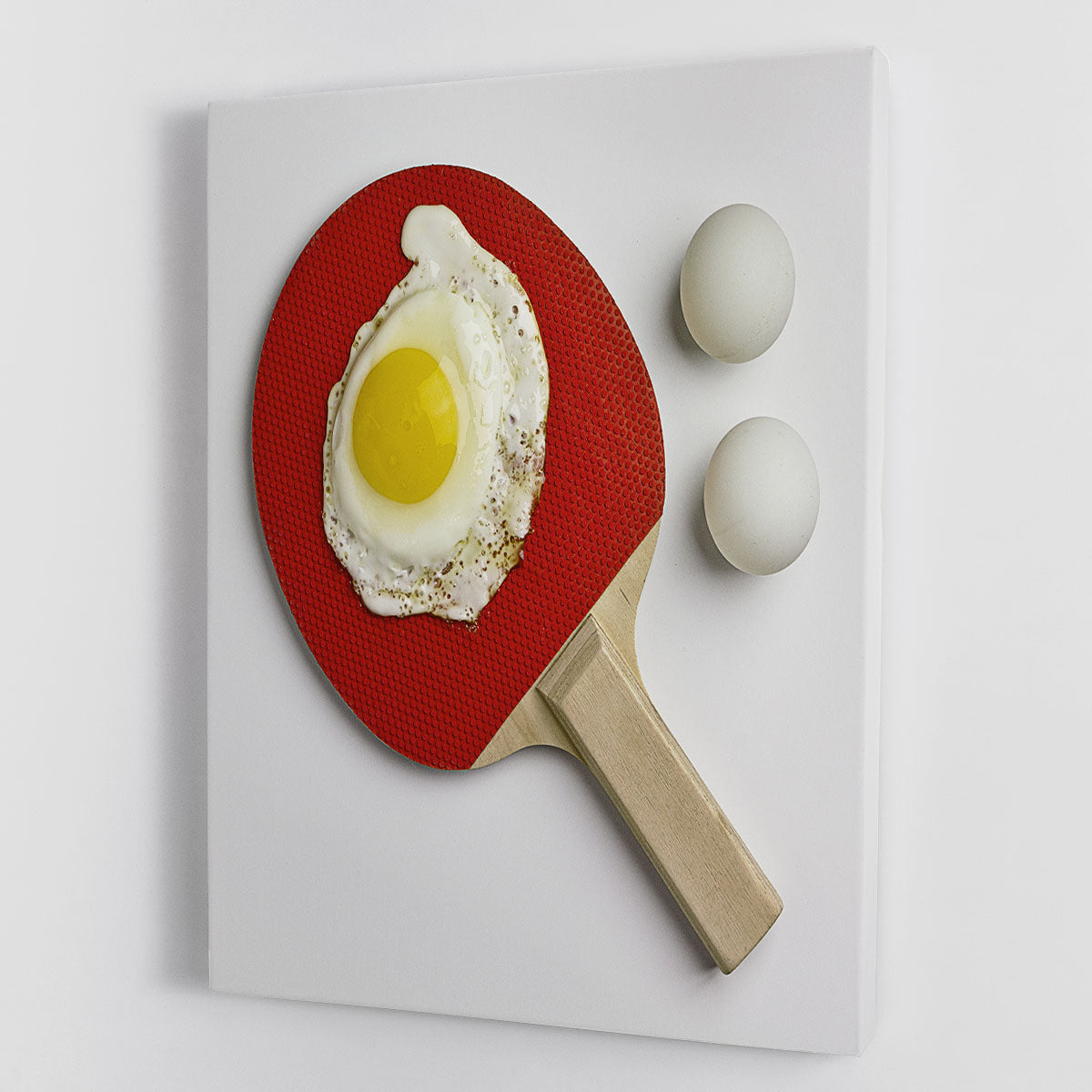 Egg Ping Pong Canvas Print showcasing vibrant colors and unique design, perfect for home or office decor.