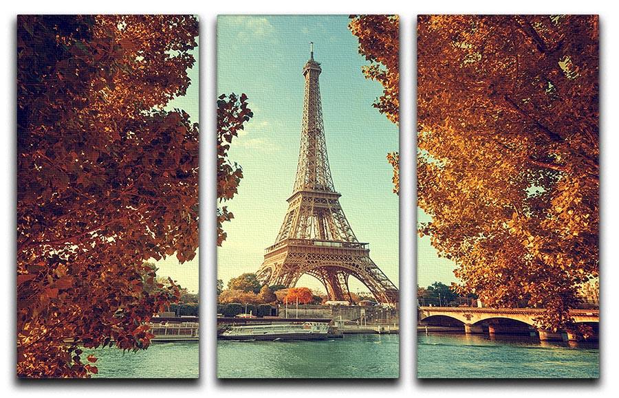 Three-panel canvas print featuring the Eiffel Tower surrounded by autumn foliage, showcasing vibrant colors and elegant design.