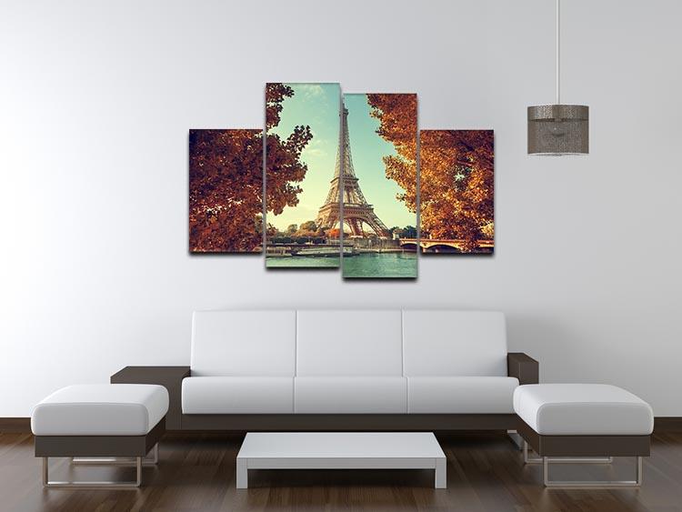 A beautiful 4-panel canvas artwork depicting the Eiffel Tower surrounded by autumn foliage in vibrant colors.