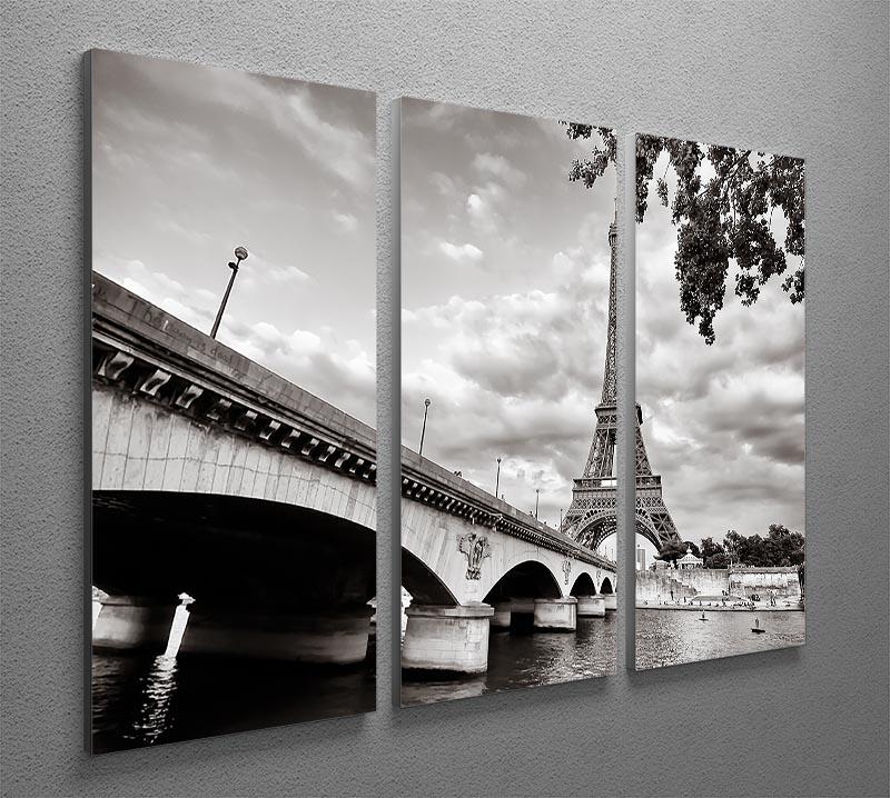 Three-panel canvas print featuring a stunning view of the Eiffel Tower from the Seine River, showcasing vibrant colors and intricate details.