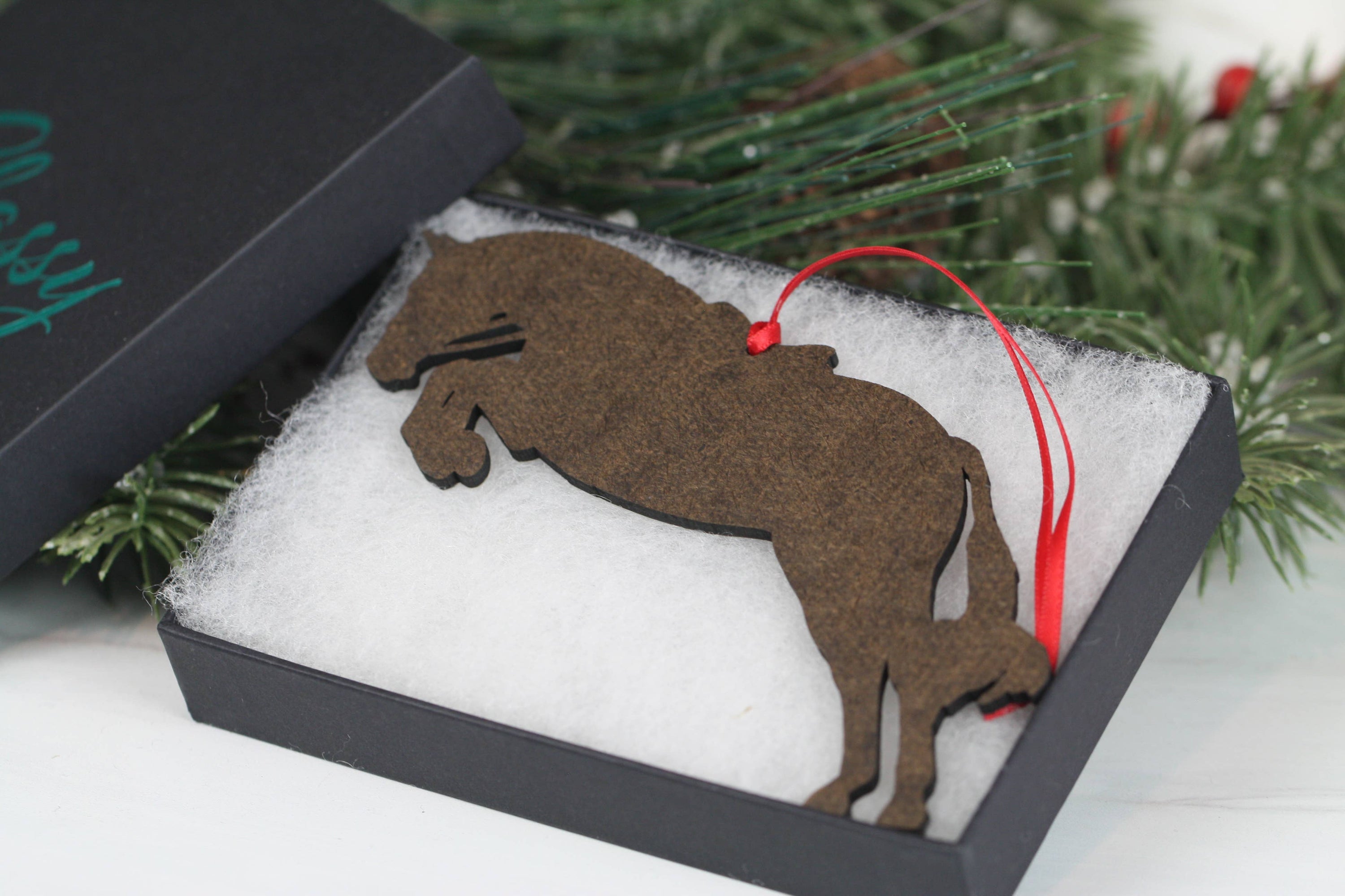 Elegant Equestrian Bay Tobiano Horse Ornament featuring a bay and white design with red and black ribbons, perfect for holiday decor.